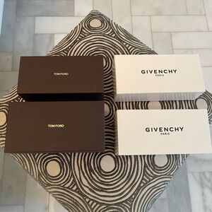 Four Designer sunglass boxes